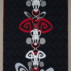 Newspaper Totem: Black and White and Re(a)d All Over<br>
Deborah K. Snider, copyright 2021<br>
Art Quilt<br>
15 x 30 inches<br>
Available: $1,000 (20% to Agencies Supporting Indigenous Rights) Newspaper Totem: Black and White and Read All Over